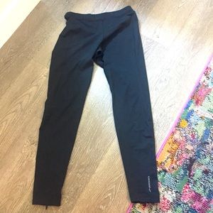 Brooks black athletic pants with zippered legs. M
